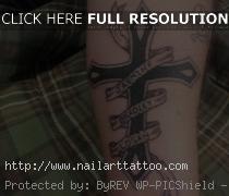 Croos With Ribbon Tattoos