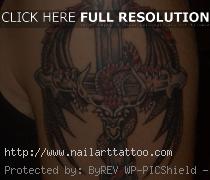 Cross And Dragon Tattoos
