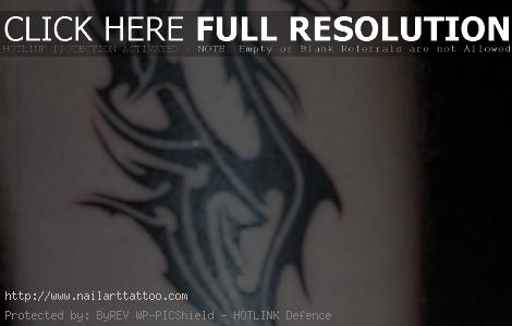 Tribal Dragon Tattoos On Leg