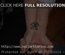 Interlocking Wedding Rings Tattoos