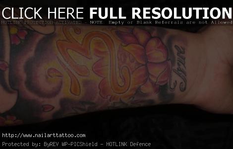 Lotus And Om Tattoos