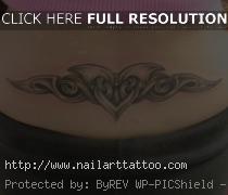 Lower Back Cross Tattoos Designs