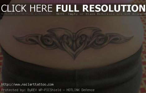 Lower Back Cross Tattoos Designs