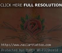 Lower Back Flower Tattoos For Women
