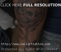 Skull In Rose Tattoos