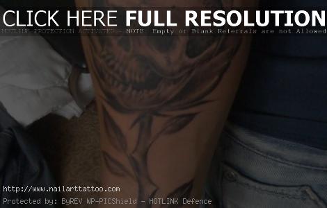 Skull In Rose Tattoos