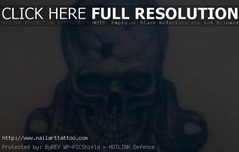 Skulls And Guns Tattoos