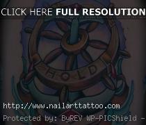 anchor and wheel tattoo
