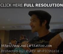 tyler posey arm band tattoo