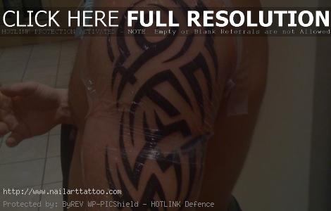 upper arm band tattoos for men