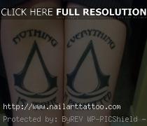 assassins creed tattoo sleeve