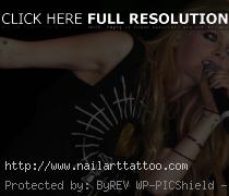 avril lavigne tattoo left arm