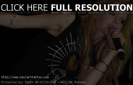 avril lavigne tattoo left arm