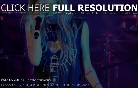 avril lavigne tattoo on arm