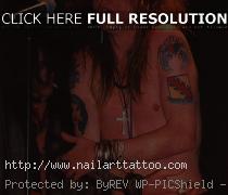 axl rose tattoos left arm