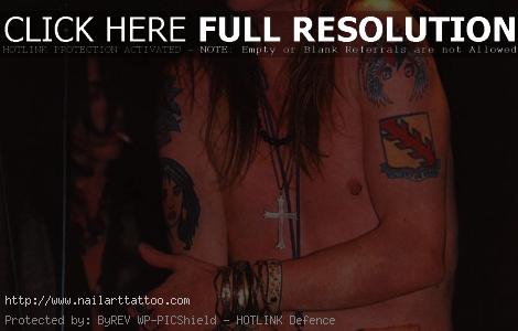 axl rose tattoos left arm