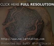 aztec calendar tattoo on back