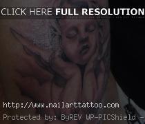 baby angel tattoos on arm