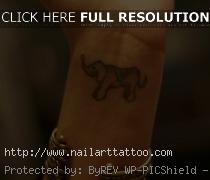 baby elephant tattoos behind ear