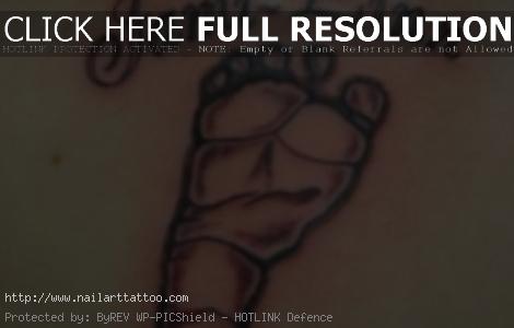 baby footprint tattoos on back