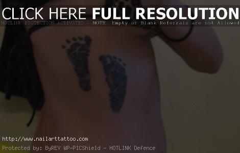 baby footprint tattoos on side