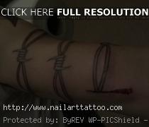 barb wire tattoos on wrist