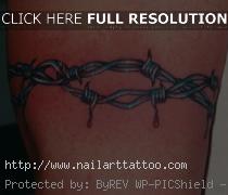 barbed wire tattoo around arm