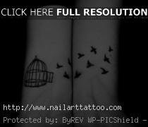 bird and cage tattoo