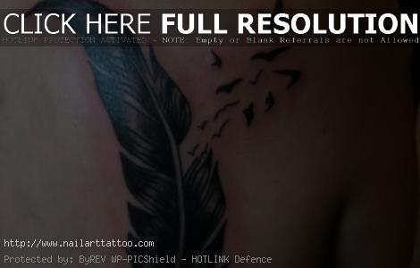 bird feather tattoo on shoulder