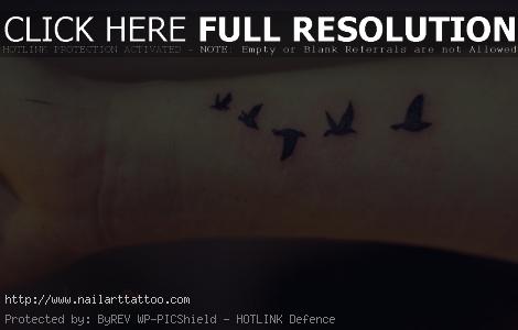 bird flying tattoo meaning