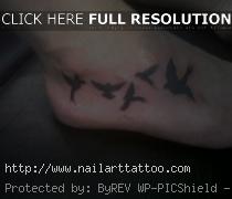 bird silhouette tattoo on foot