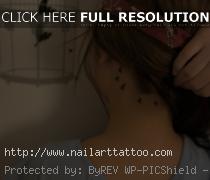 bird silhouette tattoo rib cage