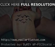 bird tattoo on wrist tumblr