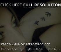 bird tattoos for men wrist