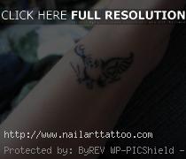 bird tattoos on wrist for girls