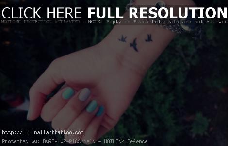 bird wrist tattoos for girls