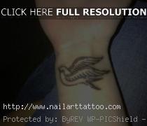 bird wrist tattoos meaning