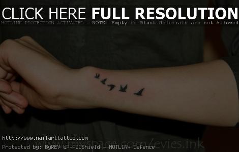 birds flying tattoo