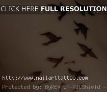 birds flying tattoo design