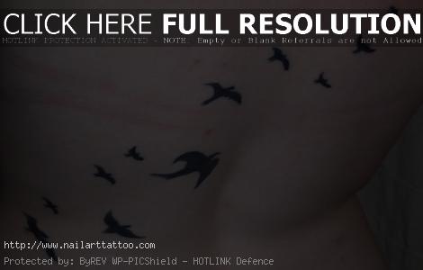 birds flying tattoo on wrist