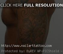 black and gray tattoos on dark skin