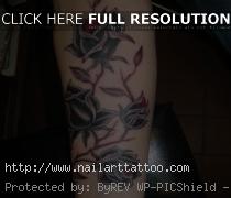 black and grey rose tattoo forearm