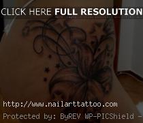 black and white flower tattoos hip