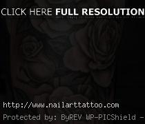 black and white flower tattoos on arm