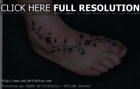 black and white flower tattoos on foot