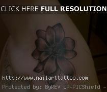 black and white flower tattoos on shoulder