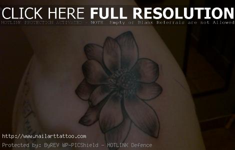 black and white flower tattoos on shoulder