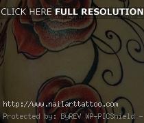 black and white flower tattoos on shoulder