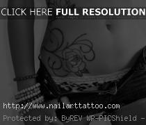 black and white flower tattoos on side