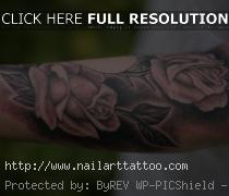 black and white rose tattoo arm